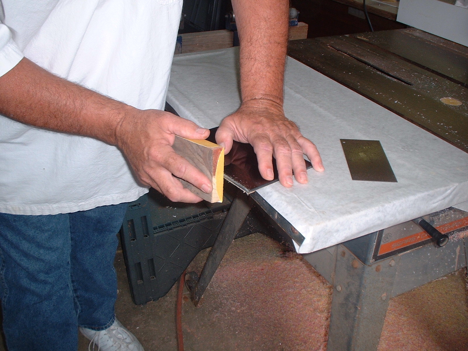 This page will describe what tools are recommended and how to sand the edges of a wooden panel in preparation for painting.